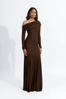 Deme by Gabriella Irene Espresso brown maxi dress with flowing fabric and long sleeves, displayed on a model against a neutral background.