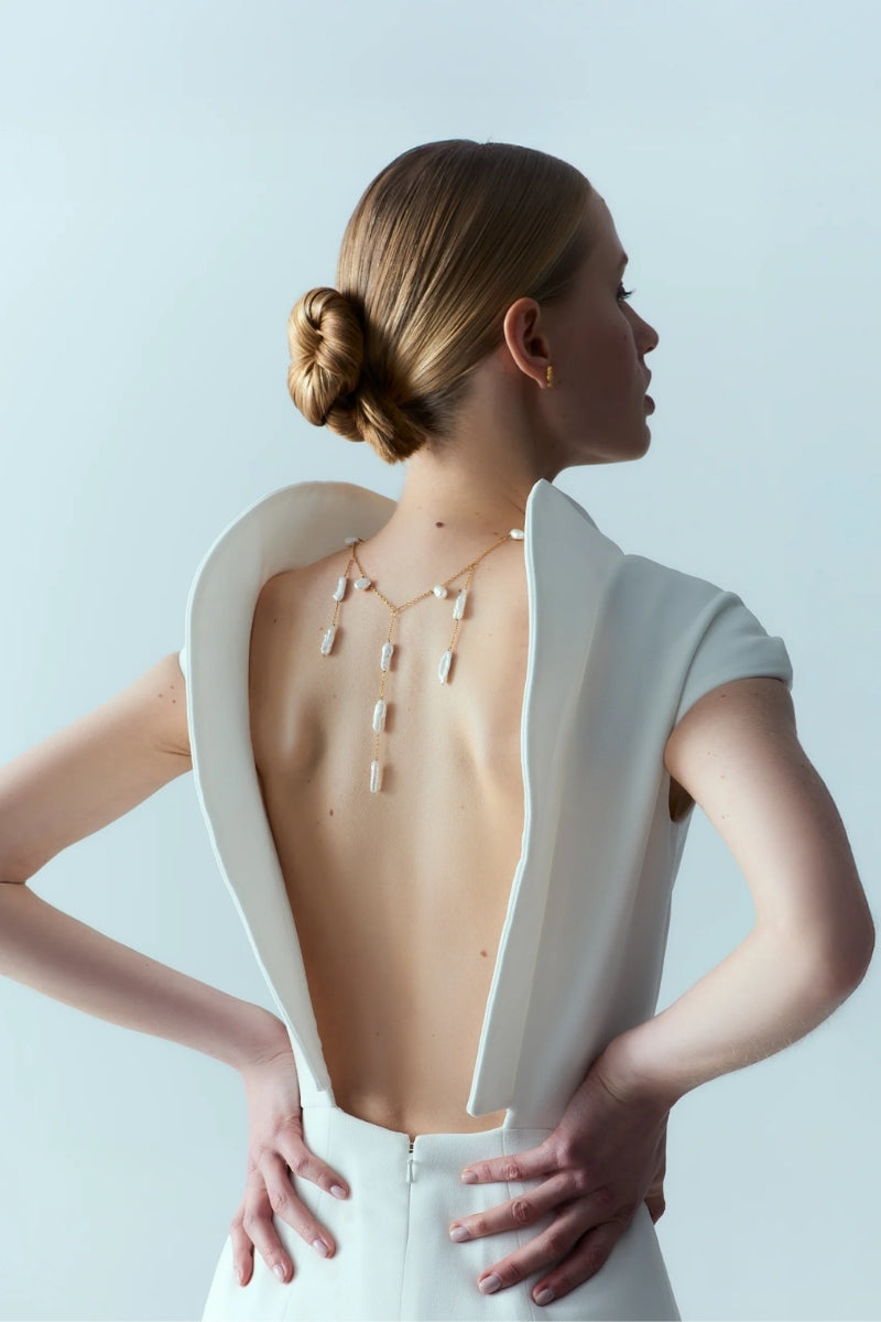 Elegant Iris Pearl Necklace by Lavani Jewels featuring freshwater pearls and delicate chain design.