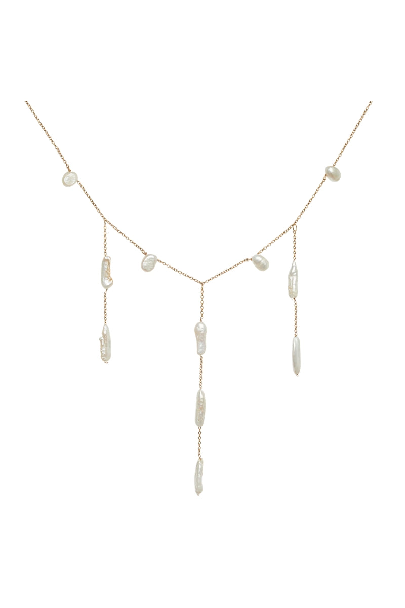 LAVANI JEWELS Iris Pearl Necklace featuring elegant white pearls on a delicate chain, perfect for sophisticated jewelry style.