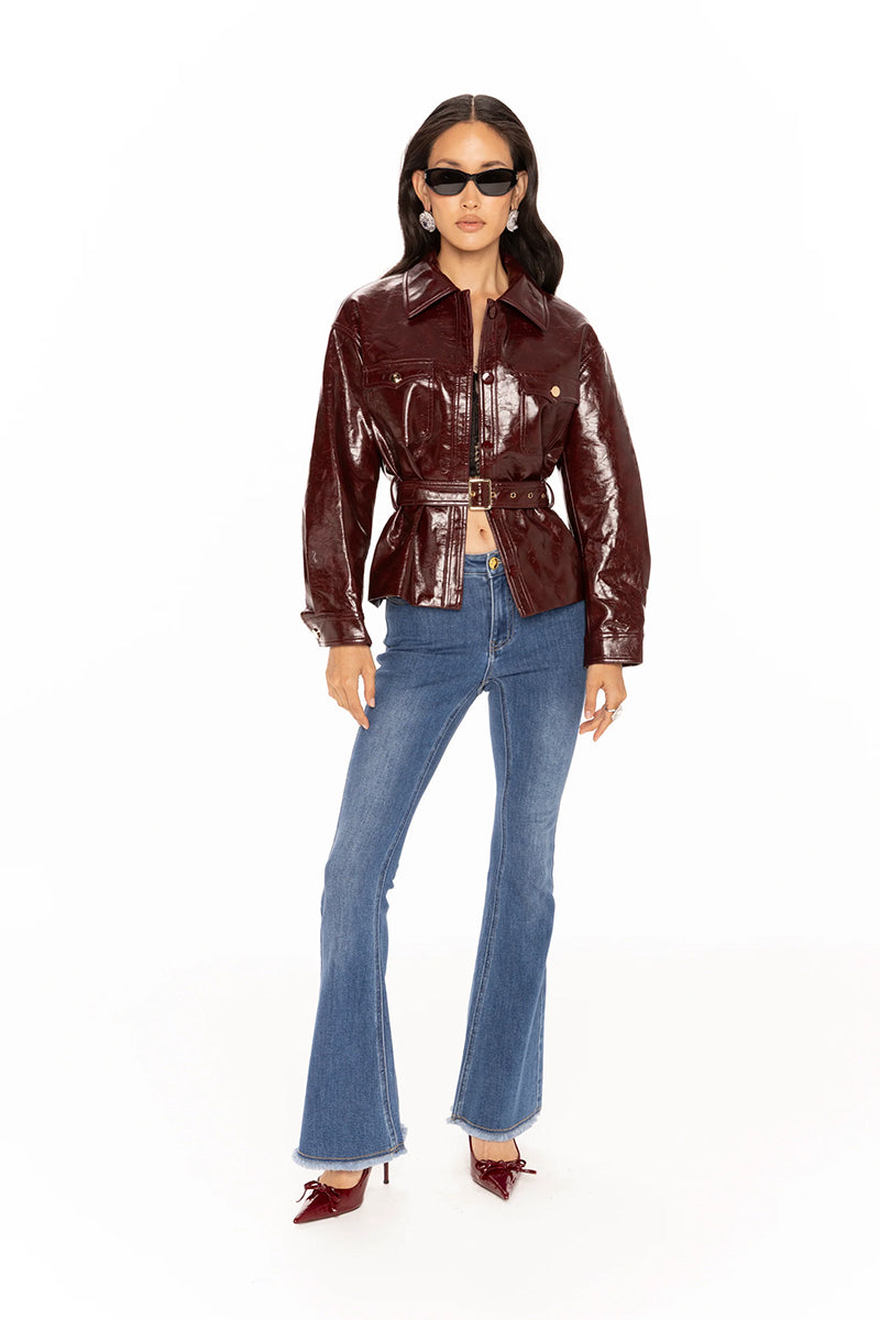 Nana Jacqueline Isabella leather jacket in rich claret color, stylish and fitted, shown on a model with a modern casual look.