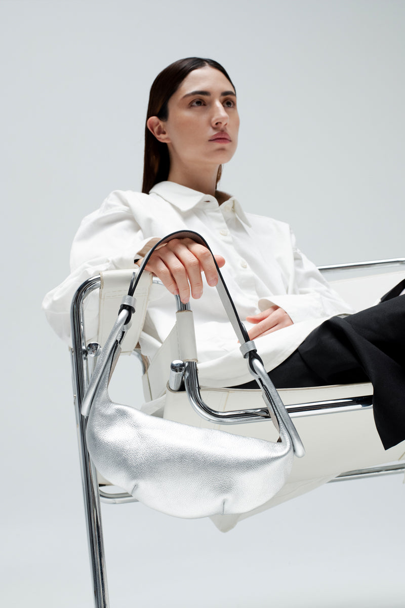 Silver Isidora Malva Amalfi Mini shoulder bag with sleek design and compact size, featuring a stylish silver finish.