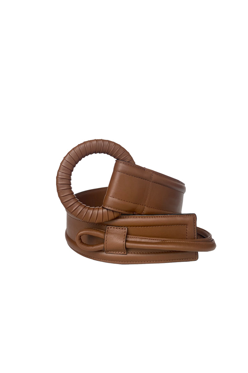 Brown leather Belen belt by Isidora Malva featuring a simple buckle and stylish design.