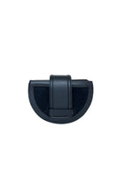 Black Isidora Malva Luna clutch with sleek leather and suede design, front view showcasing compact style and elegant details.