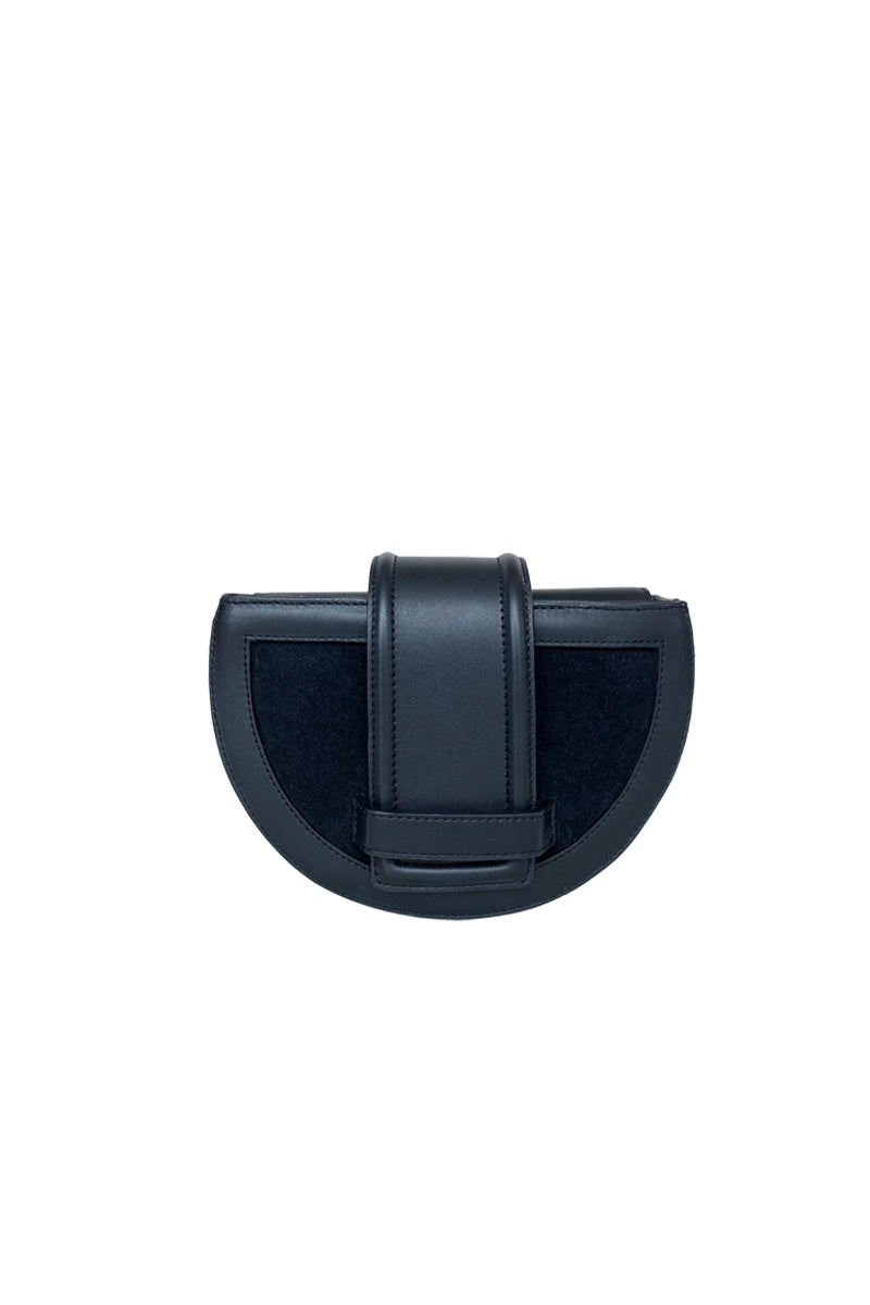 Black Isidora Malva Luna clutch with sleek leather and suede design, front view showcasing compact style and elegant details.