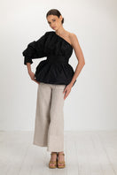 Black Isolde top by ANA + MARIA, featuring a fitted design and short sleeves, displayed on a neutral background.