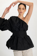 Black Isolde top from ANA + MARIA, stylish sleeveless top with a fitted silhouette, shown on a model.