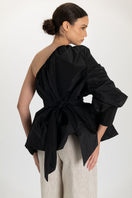 Black Ana + Maria Isolde top displayed on a mannequin, showcasing its stylish design and fit.