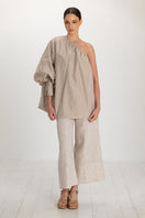 ANA + MARIA Isolde Smoke Gray top displayed on a hanger with a fitted, stylish design and soft fabric.