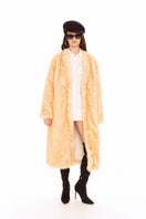 Nana Jacqueline Isolde faux fur long coat displayed on a model, featuring plush texture and elegant design.