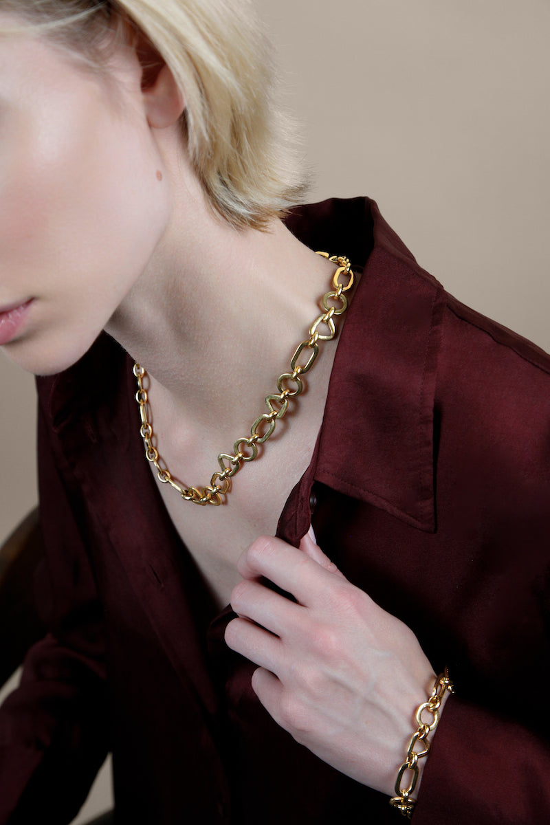 Elegant Italian necklace in yellow gold vermeil with a delicate chain, styled by Sara Shala.