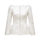 Ivory brocade blazer by Montsand, tailored fit with intricate floral pattern, featuring a single-breasted design and notched lapels.