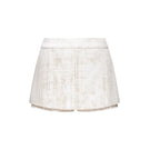 Ivory brocade mini skirt by Montsand featuring intricate floral patterns and a fitted waistband.