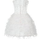 Ivory Montsand mini dress with floral pattern, sleeveless design, and fitted silhouette, perfect for summer or casual occasions.