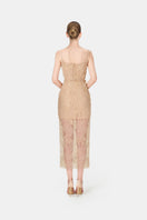 Ivory beaded lace pencil gown by Montsand, showcasing intricate beadwork and elegant fitted silhouette suitable for formal occasions.