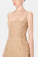 Ivory beaded lace pencil gown by Montsand featuring intricate beadwork and a fitted silhouette.
