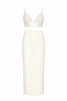 Ivory crystal maxi co-ord set by Monika Dimova featuring a flowing skirt and matching top with crystal embellishments.