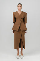 Brown NELA blazer by Izakova, tailored fit with lapels, shown on a hanger against a neutral background.