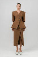 Brown Neda midi skirt by Izakova, featuring a sleek, flowing design perfect for stylish casual or dressy outfits.