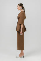Brown Izakova Nela blazer shown on a hanger, featuring a tailored fit and classic lapel style.