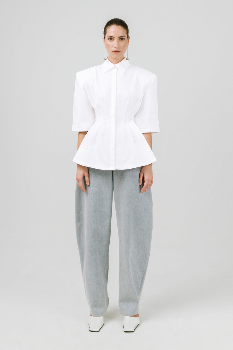 Off-white Izakova EDISA shirt displayed on a hanger, showcasing a stylish, casual button-up shirt with a classic fit.
