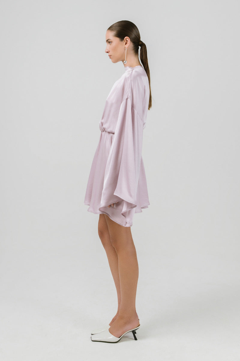 Izakova Nina lavender mini dress displayed on a hanger, showcasing lightweight fabric and stylish sleeveless design.