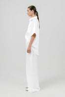 White Melanie pants by Izakova featuring a stylish, tailored fit and clean design, perfect for casual or dressy outfits.