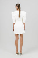 Off-white Mila blazer dress by Izakova, featuring a tailored mini dress design with structured blazer details.