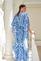 Nana Gotti Izara kaftan maxi dress with vibrant patterns and flowing fabric, perfect for stylish, comfortable summer wear.