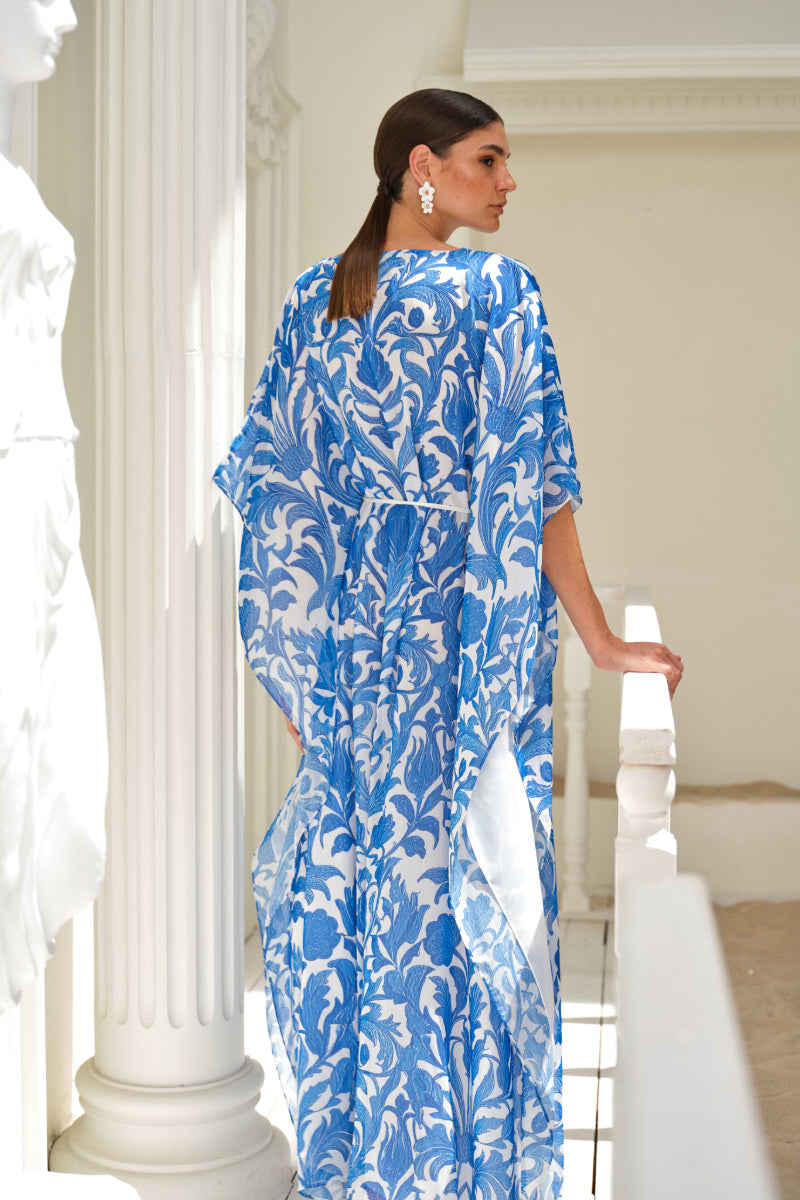 Nana Gotti Izara kaftan maxi dress with vibrant patterns and flowing fabric, perfect for stylish, comfortable summer wear.