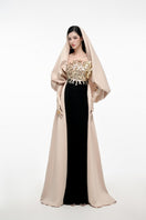 Elegant JOSÉPHINE KEIRA gown in soft fabric with intricate detailing, showcased on a mannequin.