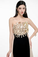 Elegant KEIRA gown by JOSÉPHINE featuring flowing fabric and intricate detailing, perfect for formal occasions.
