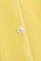 Yellow Manito Diva pajama set featuring a comfortable, stylish top and pants for cozy sleepwear or loungewear.