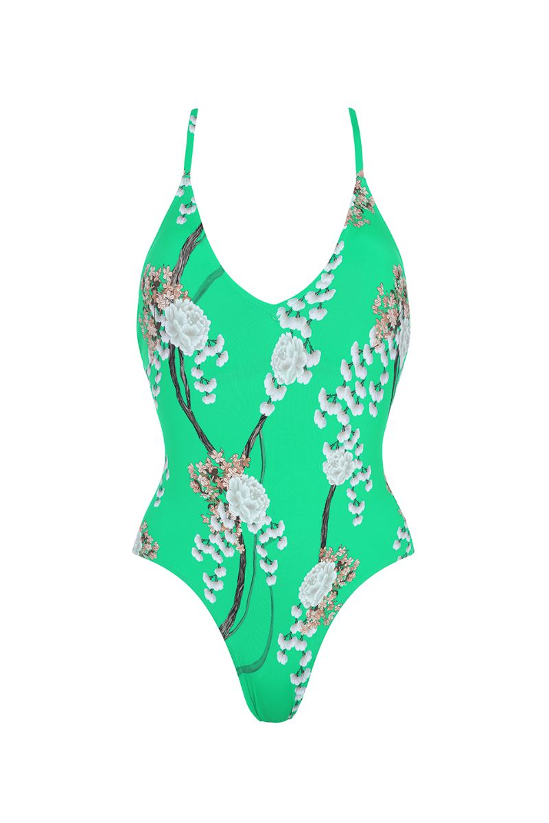 Aguaclara Jade one-piece swimsuit featuring a sleek design with vibrant colors and a flattering fit, displayed on a mannequin.