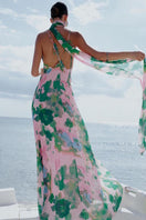 Soft pink and green maxi dress by SISTERS, featuring flowing fabric and elegant design, perfect for casual or semi-formal wear.
