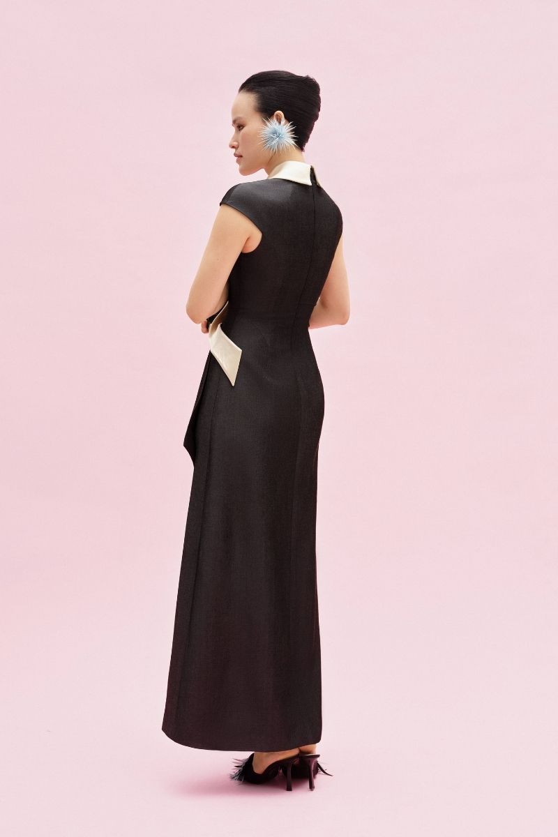 Jenny K Tran Jarrow midi dress featuring a flowing fabric and elegant design, perfect for stylish occasions.