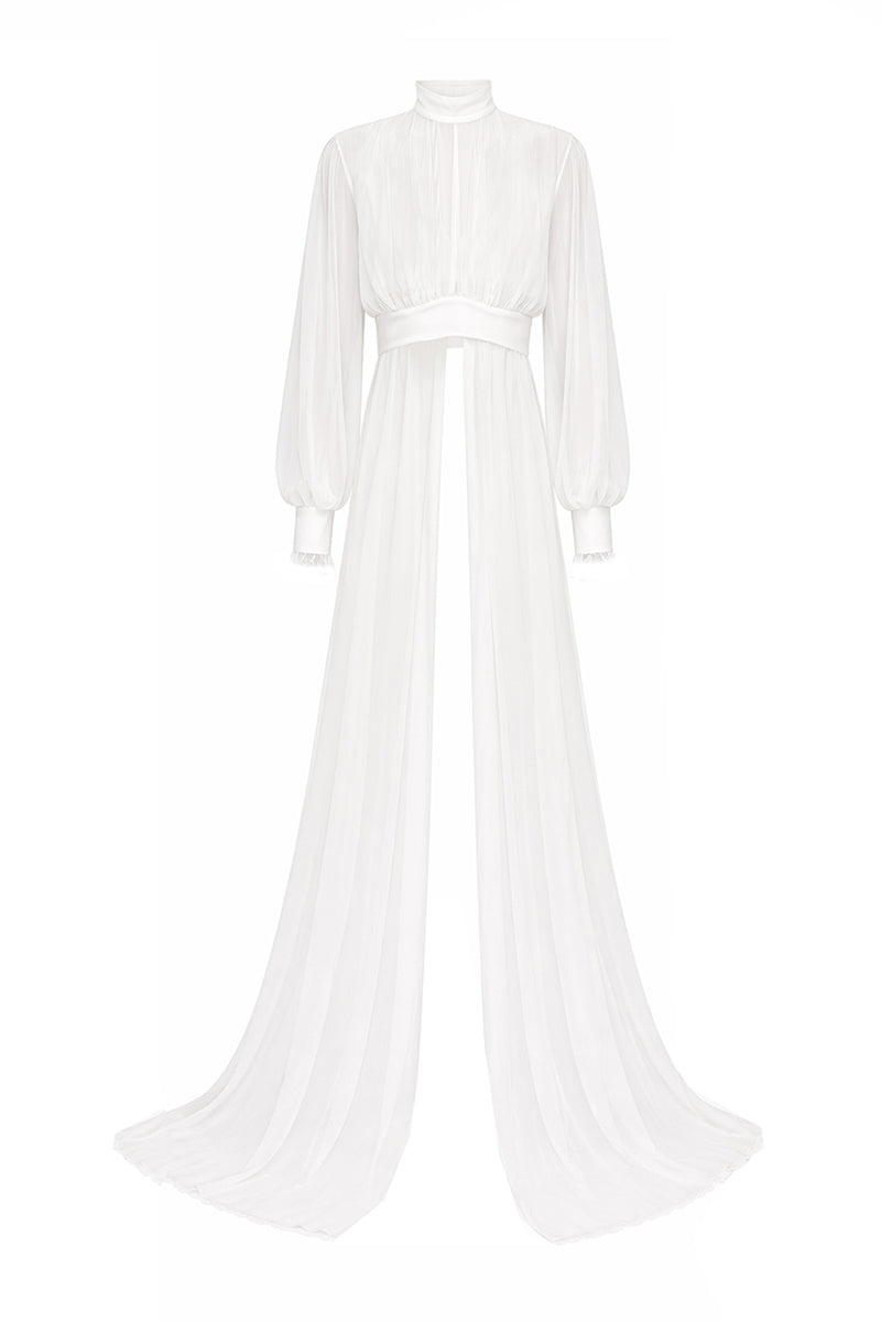 Cropped bridal cape in Bambula silk by JC Pajares, showcasing elegant draping and luxurious fabric for wedding cover-up.
