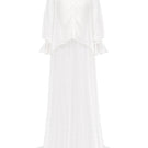 Elegant bridal cape in bambula silk by JC Pajares, showcasing delicate fabric draped over a model for a luxurious cover-up.