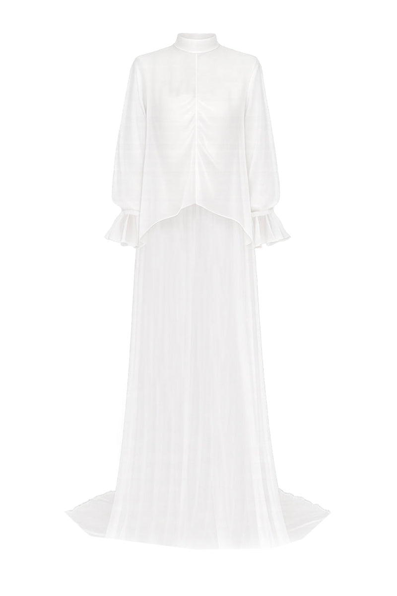 Elegant bridal cape in bambula silk by JC Pajares, showcasing delicate fabric draped over a model for a luxurious cover-up.