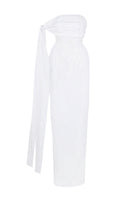 Elegant JC Pajares tulip dress in double taffeta, showcasing a flowing maxi dress with a fitted bodice and full skirt.
