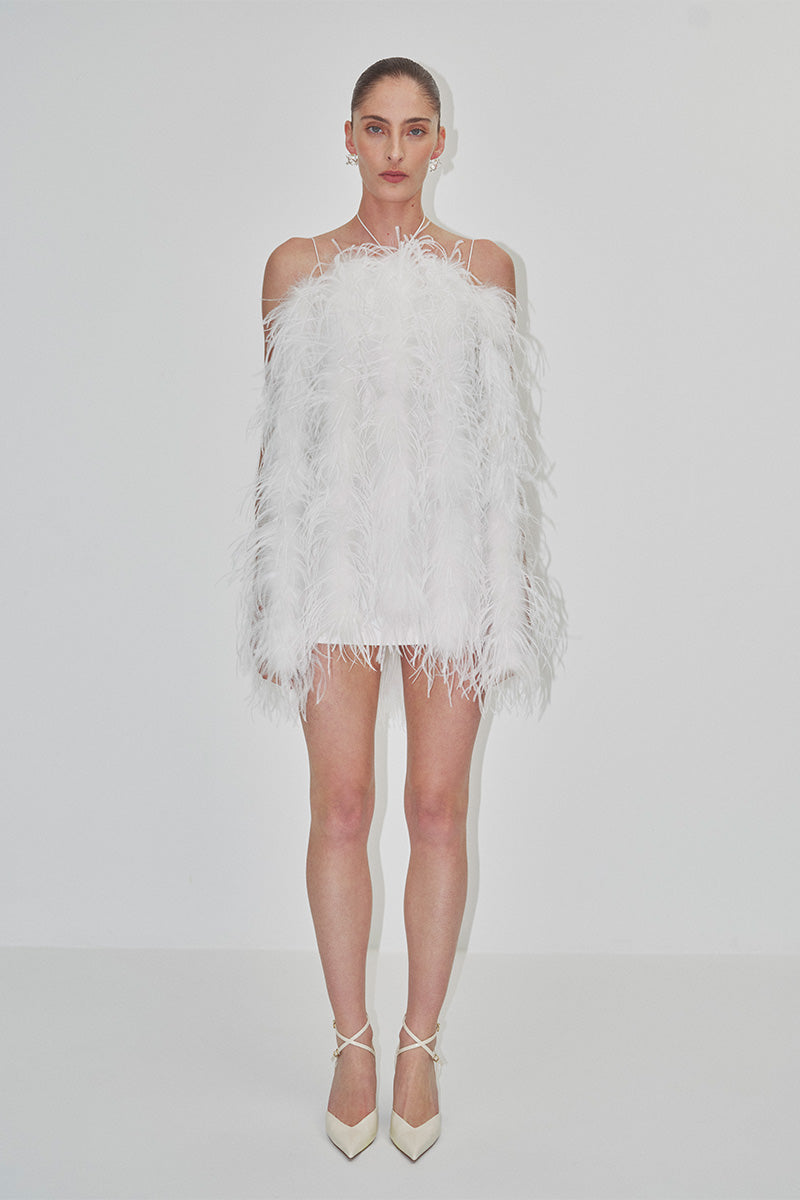 Elegant mini feather dress by JC Pajares, featuring a chic bridal-inspired design with delicate feather details.