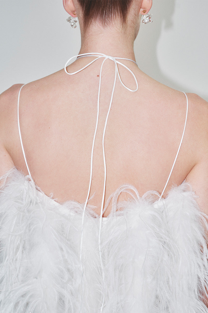JC Pajares mini feather dress, stylish bridal look with delicate feather details, perfect for special occasions or weddings