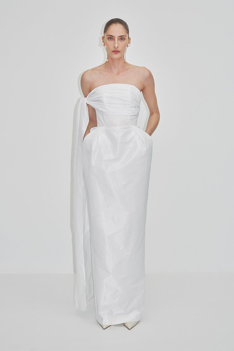 Elegant JC Pajares tulip dress in double taffeta, featuring a flowing maxi dress design with a fitted bodice and full skirt.
