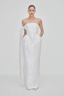 Elegant tulip dress in double taffeta by JC Pajares, featuring a flowing maxi dress silhouette with a stylish neckline.
