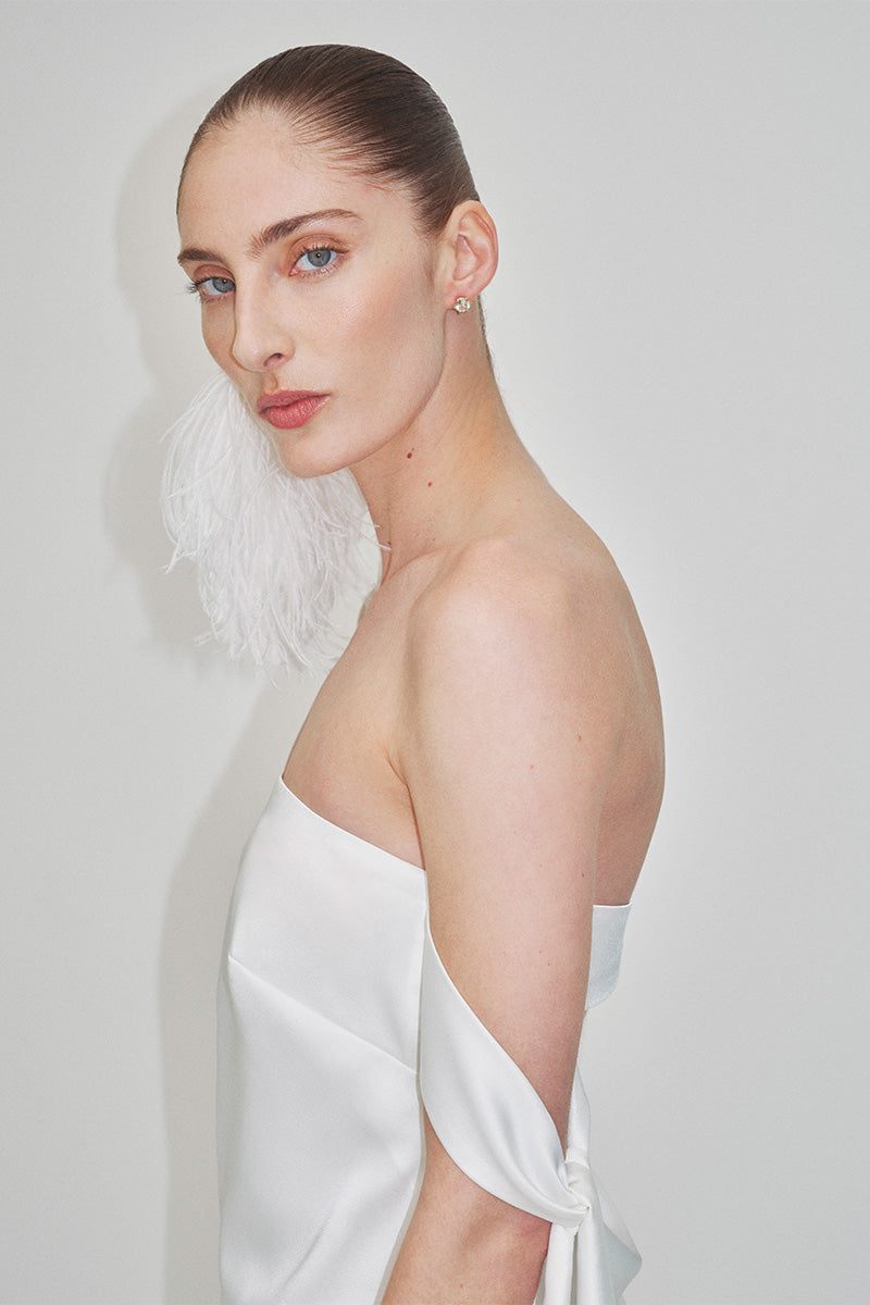 Elegant strapless satin maxi dress by JC Pajares, featuring a flowing design perfect for formal occasions or bridal looks.