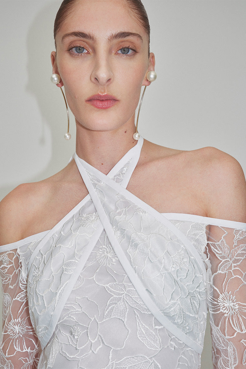 Elegant embroidered tulle maxi dress by JC Pajares with intricate embroidery and flowing silhouette, perfect for formal occasions.