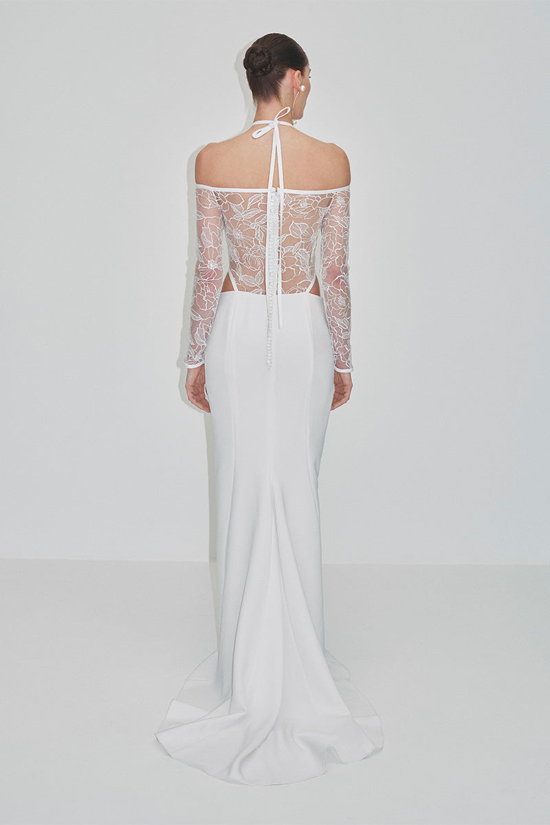 Embroidered tulle maxi dress by JC Pajares featuring delicate embroidery and elegant flowing fabric, perfect for special occasions.