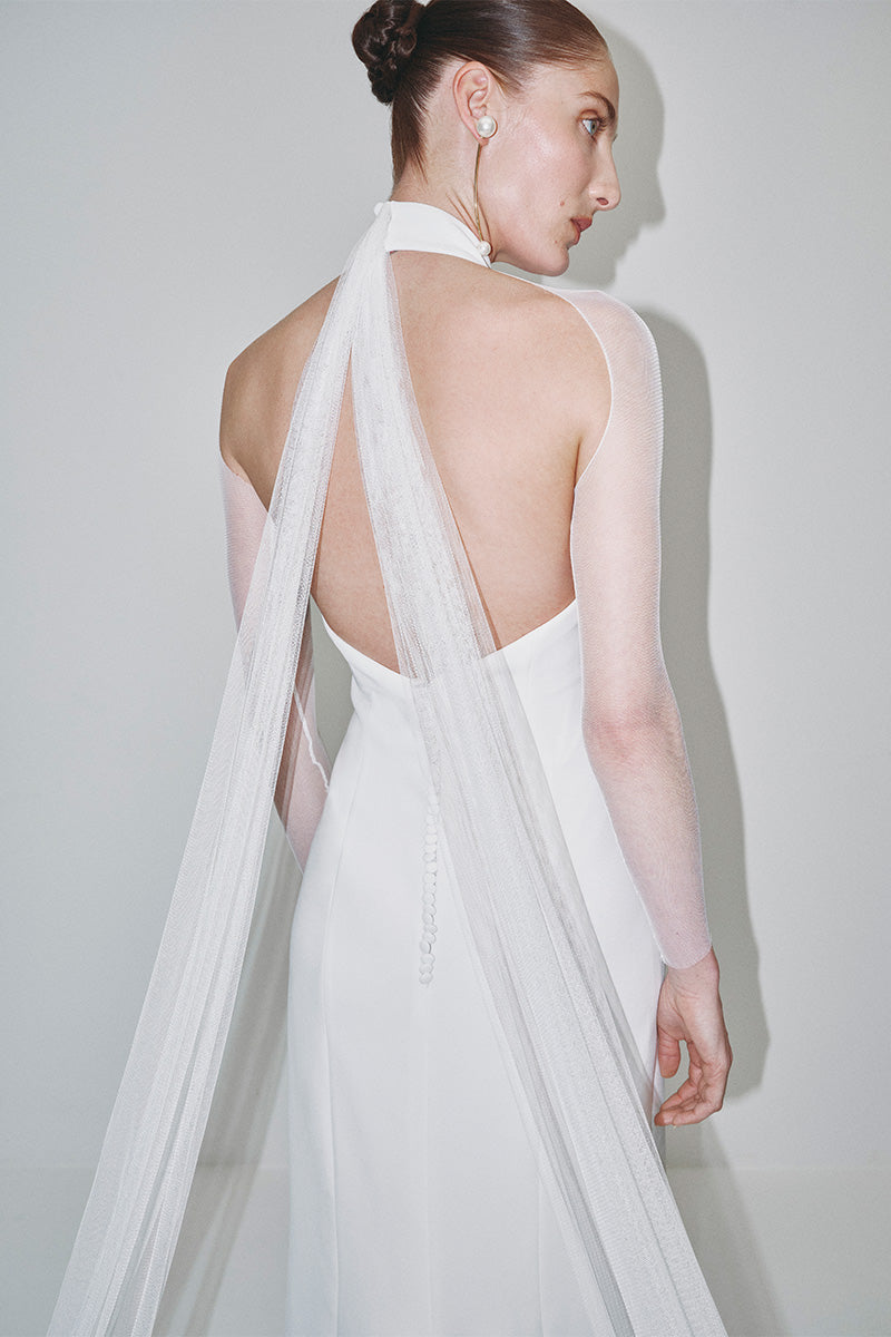 Elegant JC Pajares double crepe maxi dress with tulle sleeves, perfect for bridal or special occasions.