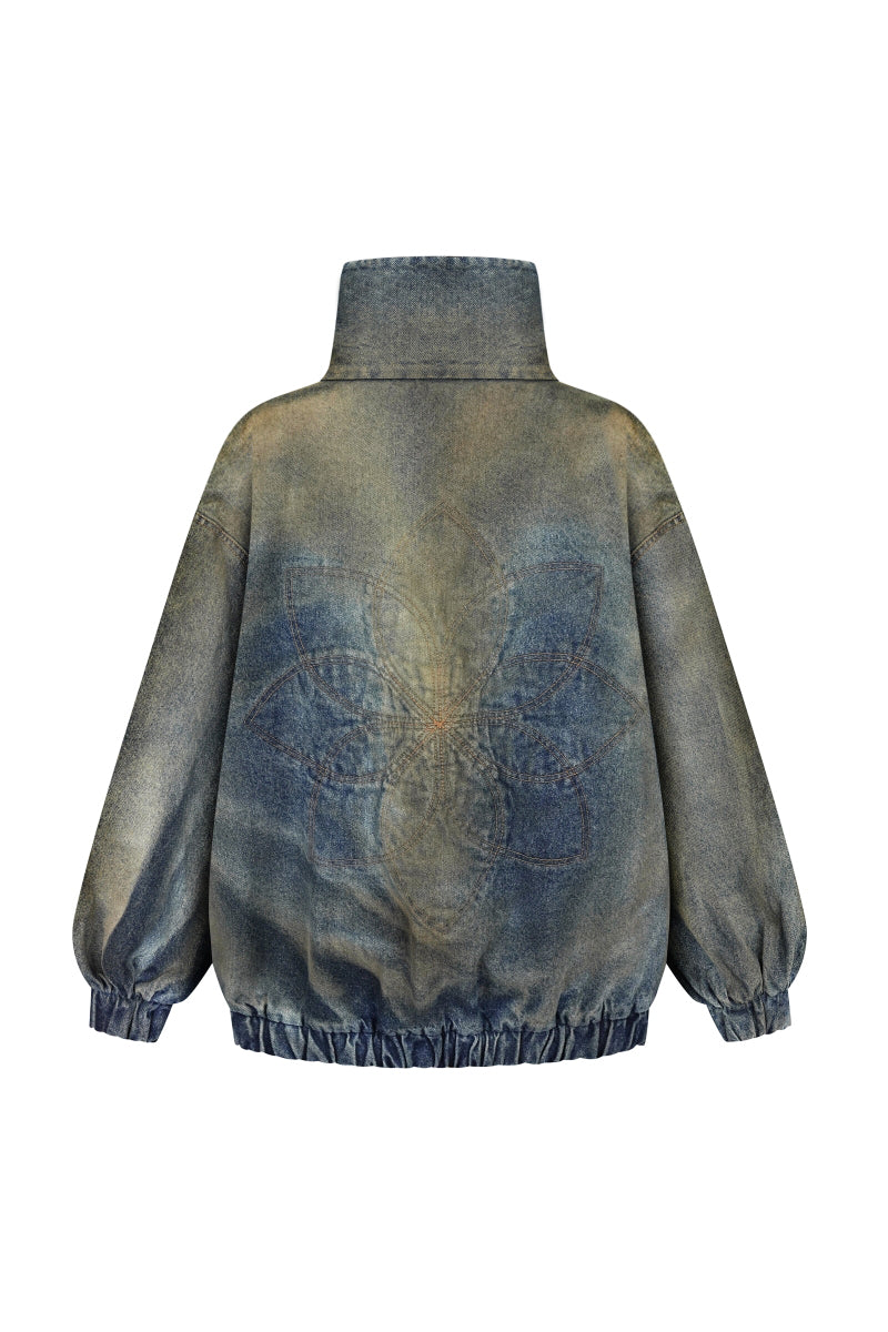 Back view of Nadya Dzyak oversized denim funnel neck bomber blazer in rusty denim fabric.