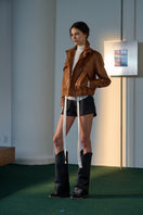 Black JOSEFA shorts by Lorena Saravia, featuring a stylish fit and casual design, shown on a model.