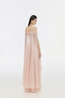 Elegant JOSÉPHINE LUNA gown with flowing fabric and detailed design, perfect for formal occasions.
